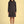 Model trägt das Kleid Anny Black Nexus – Ganzkörperansicht